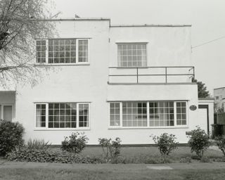 frinton park estate book image showing white modernist villa in black and white