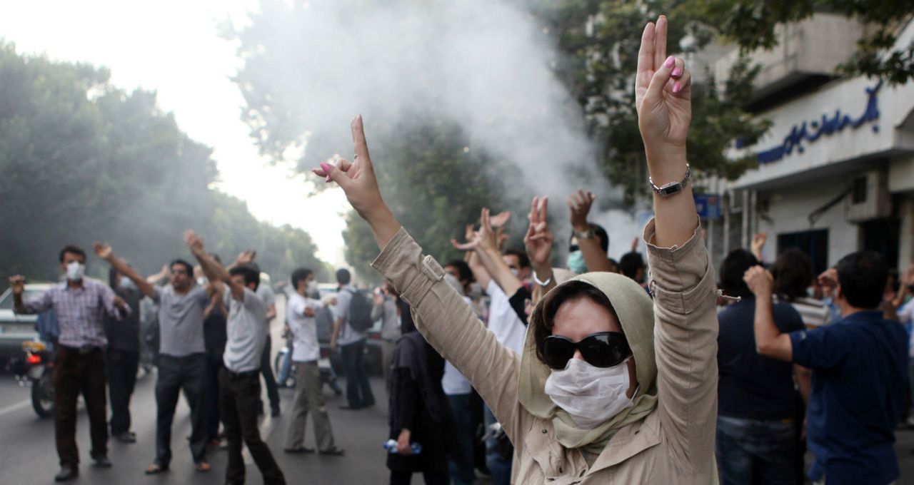 A woman protests during last major demonstrations in Tehran in 2009