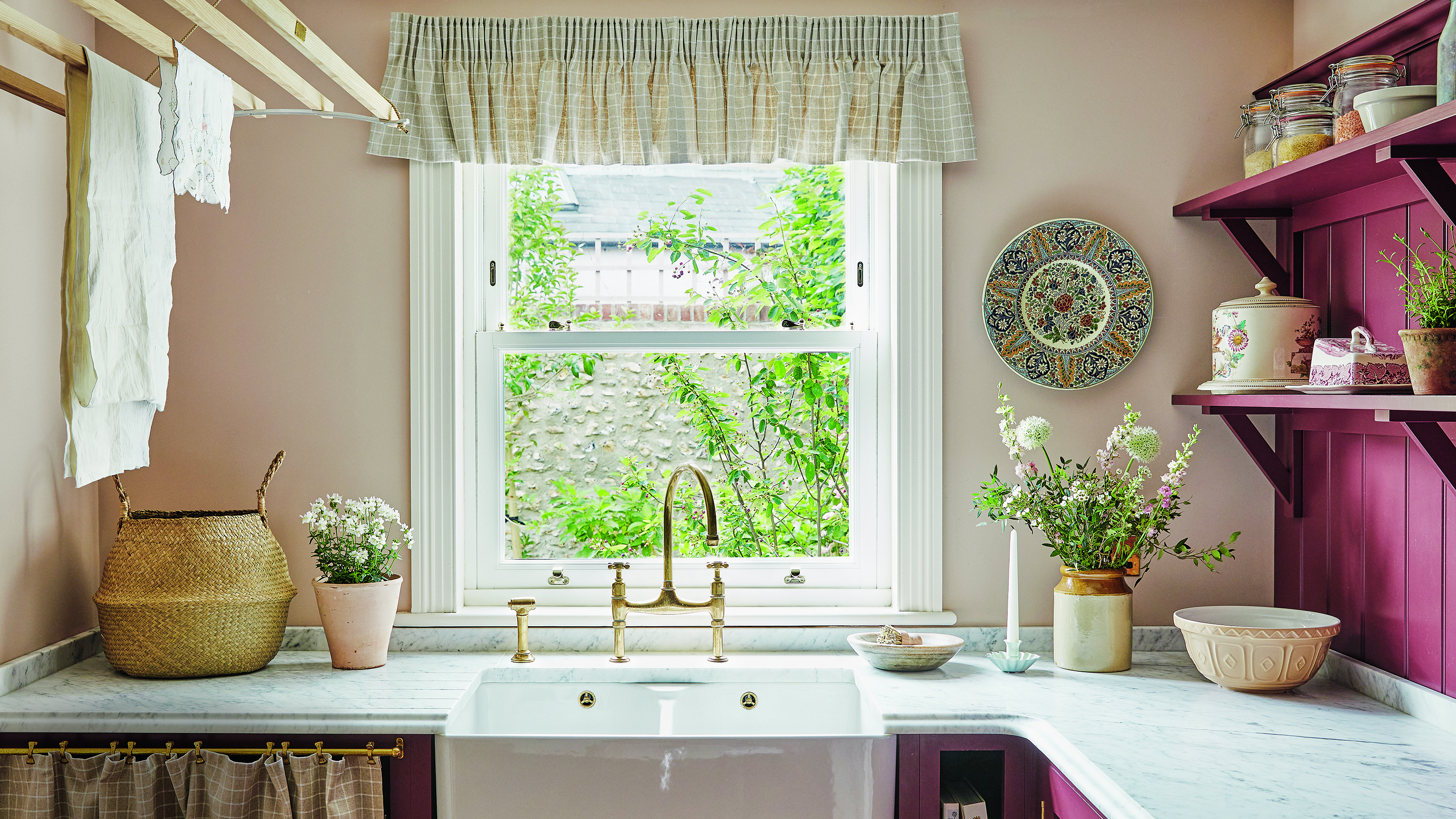 Country kitchen with frilly trim around window