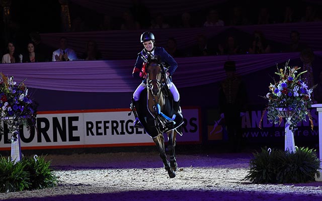 Robert Murphy riding UNCANNY owned by Kellie Hounslow, winner of the Pony Foxhunter Championship (Class 9) during HOYS in the NEC in Warwickshire in the UK on 8th October 2016