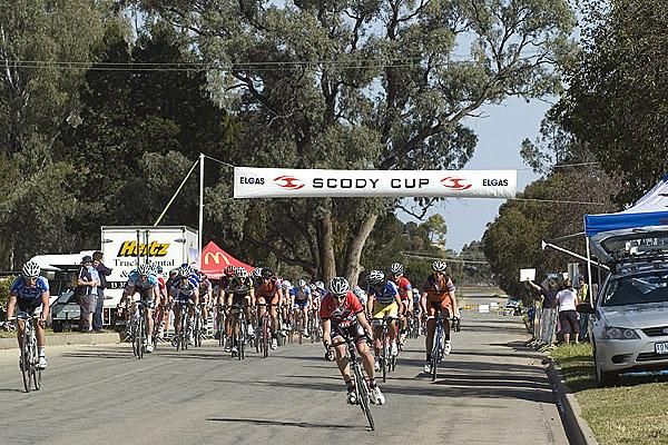 The peloton resume racing after a nasty fall on the first lap delayed a re-start for almost thirty minutes.