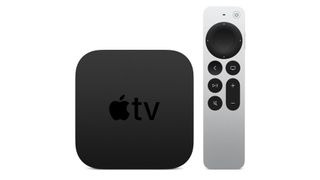 Apple TV 4K box with remote control on white background
