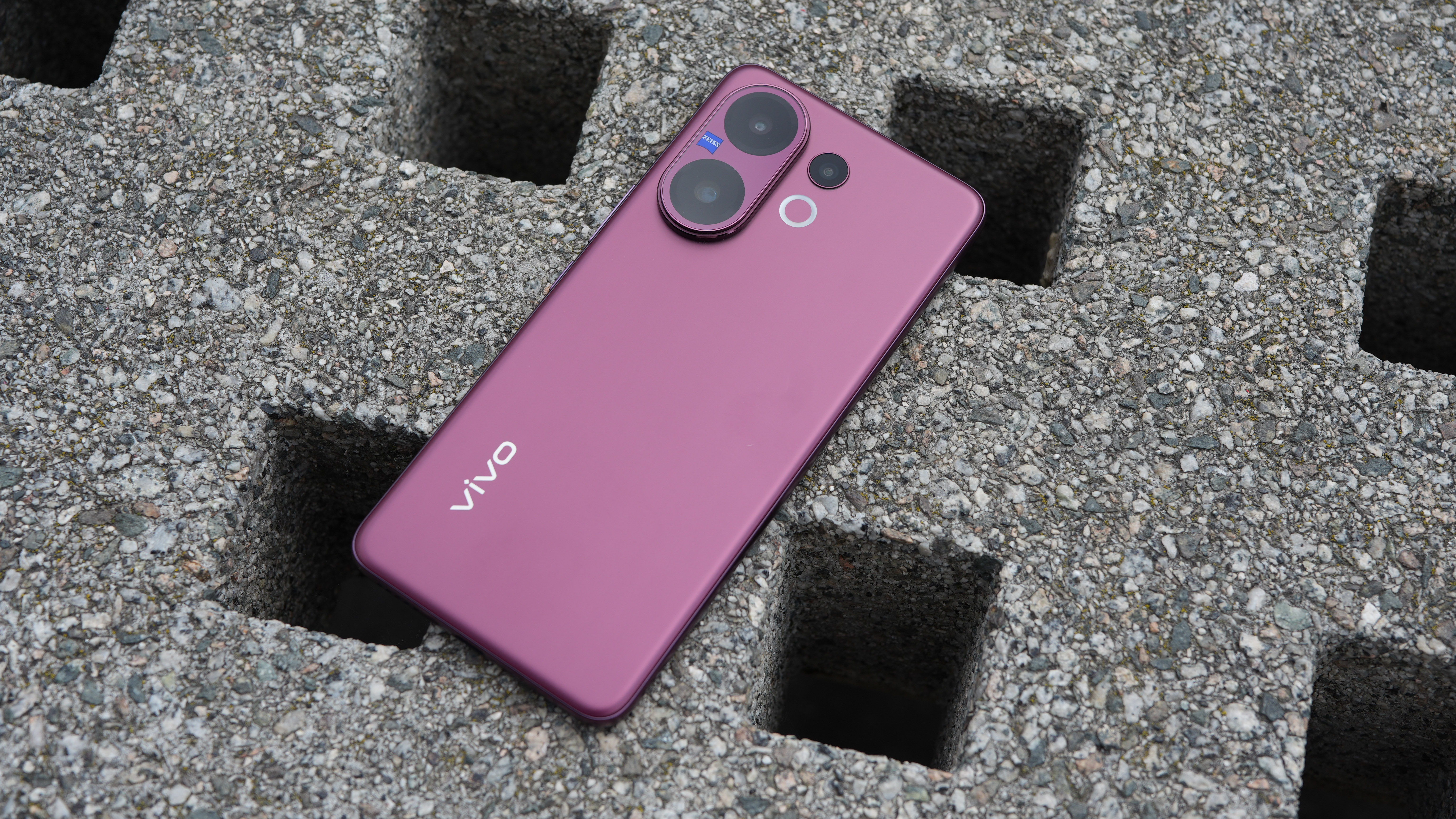 Vivo V60 phone on a stone surface