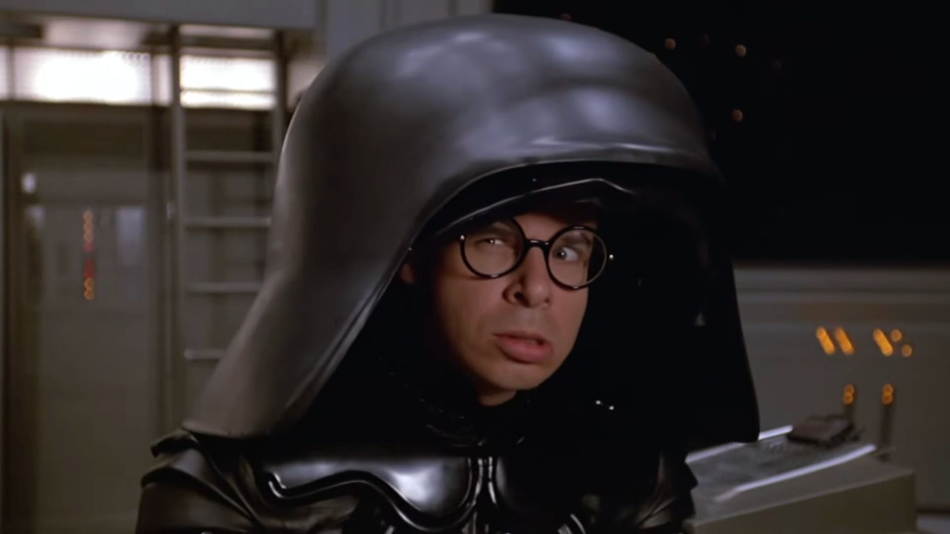 Rick Moranis making an angry face while dressed as Dark Helmet in Spaceballs.