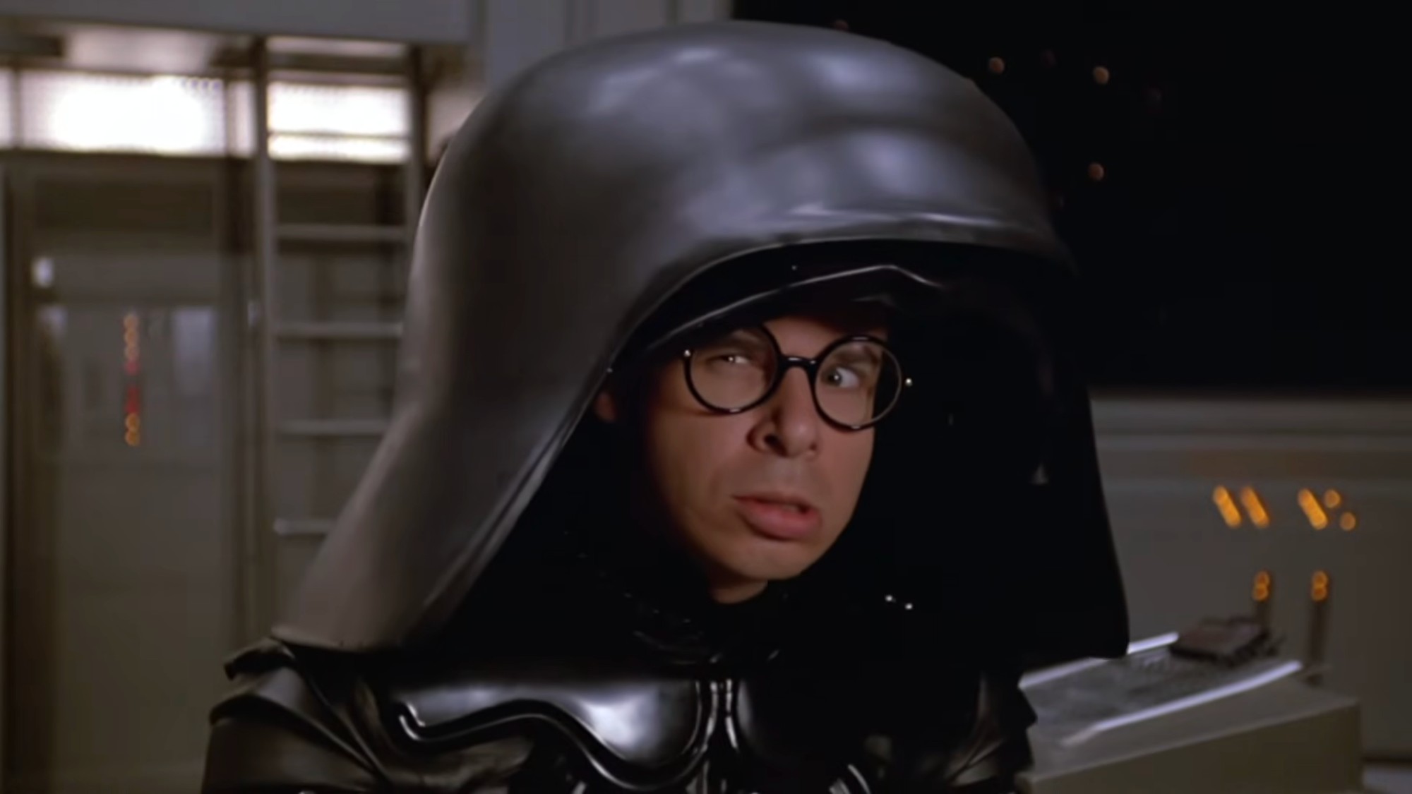 Rick Moranis making an angry face while dressed as Dark Helmet in Spaceballs. 
