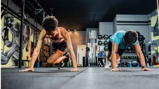 Women working out together at the gym, circuit training