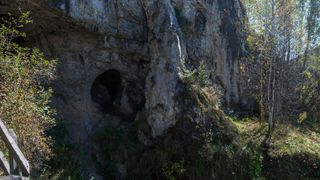 A photo of the outside of Denisova cave