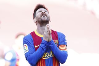 Lionel Messi shows his frustration after a missed opportunity in Barcelona's draw with Atletico Madrid