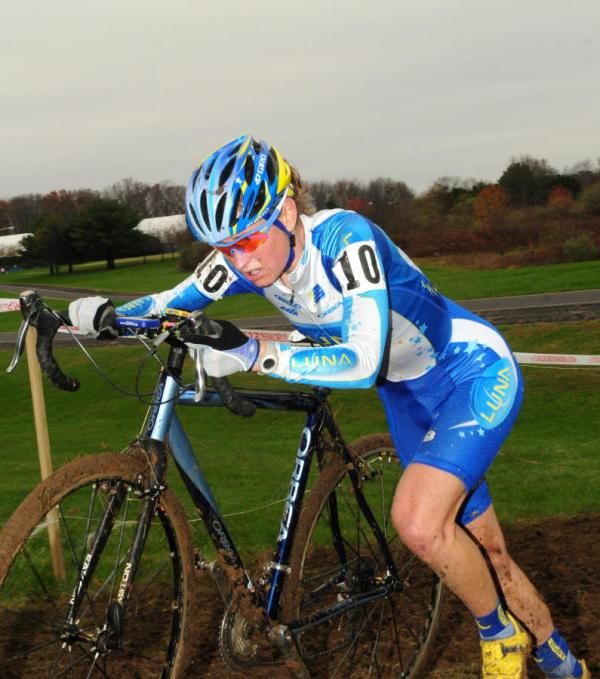 Alison Dunlap (Luna Pro Team) pushing her bike up one of the few hills.