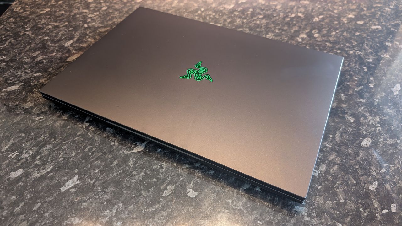 The Razer Blade 18 (2026) pictured on a black marble worktop.