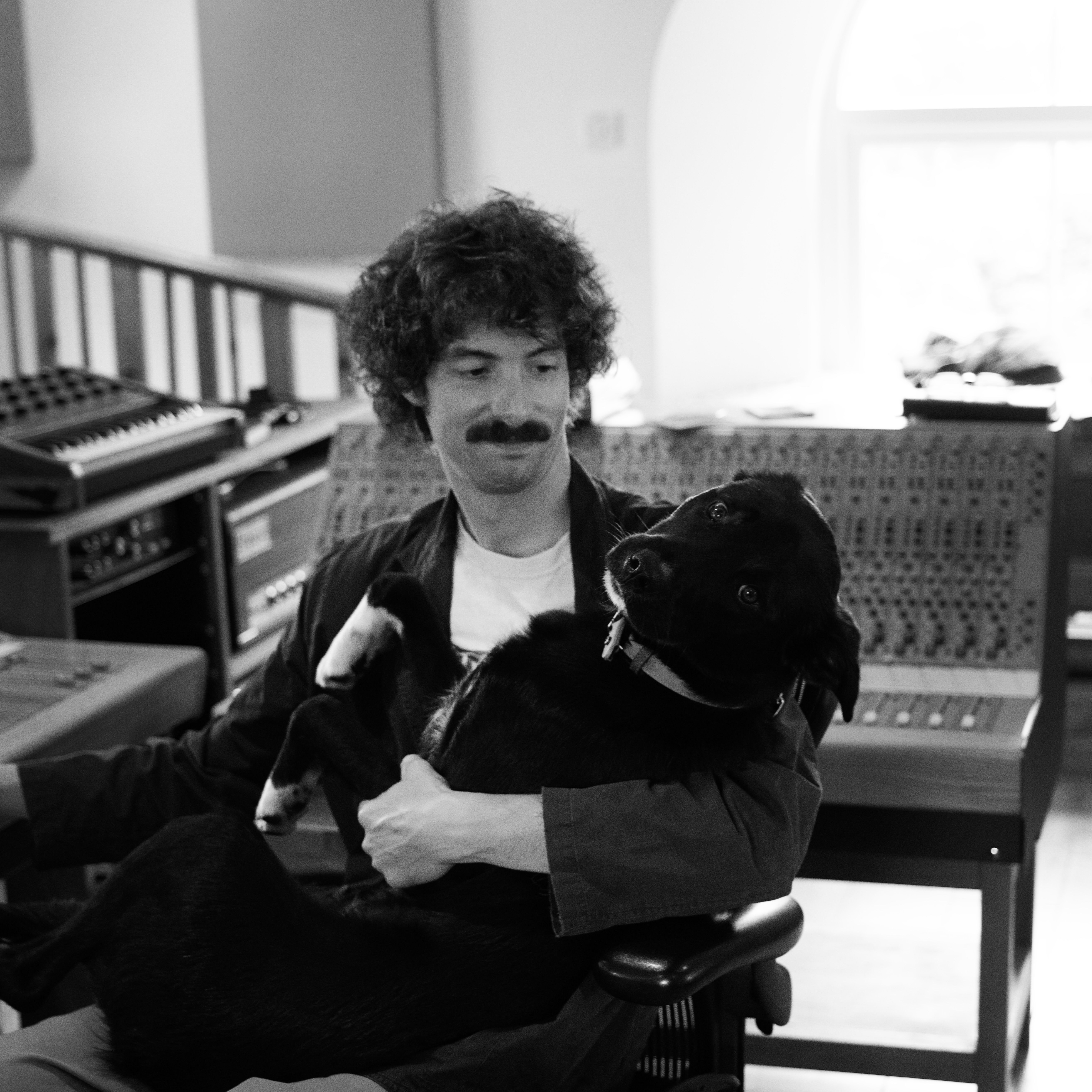 Owain Fleetwood Jenkins and his dog in the studio