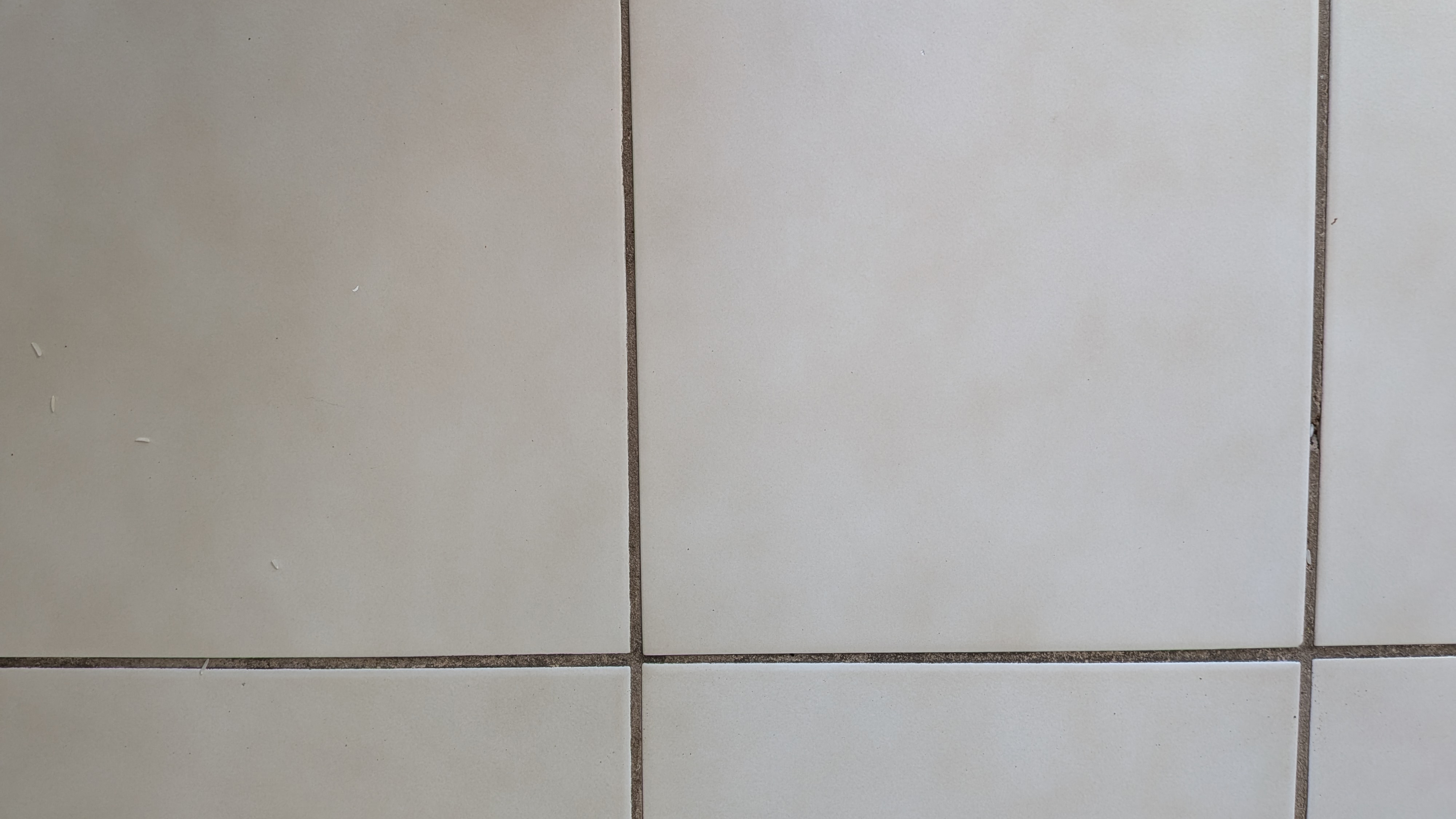 No ketchup remaining on tiled floor after the mopping test