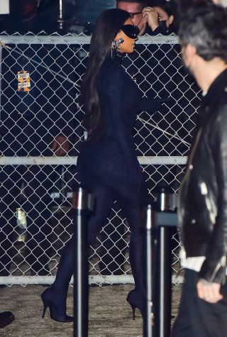 Kim Kardashian in black Balenciaga pantashoes.