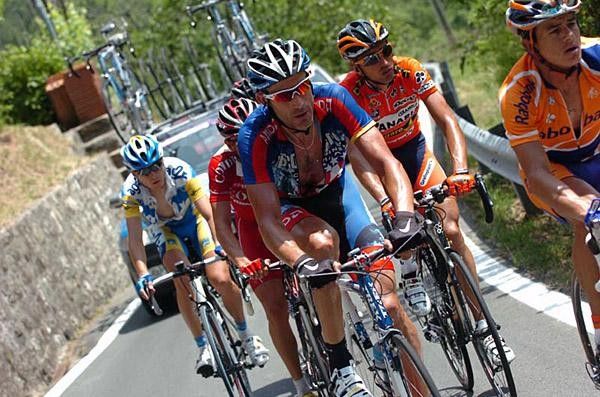 Big George Hincapie shows off his chest in the searing heat