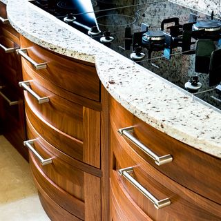 kitchen area with induction hob and drawers