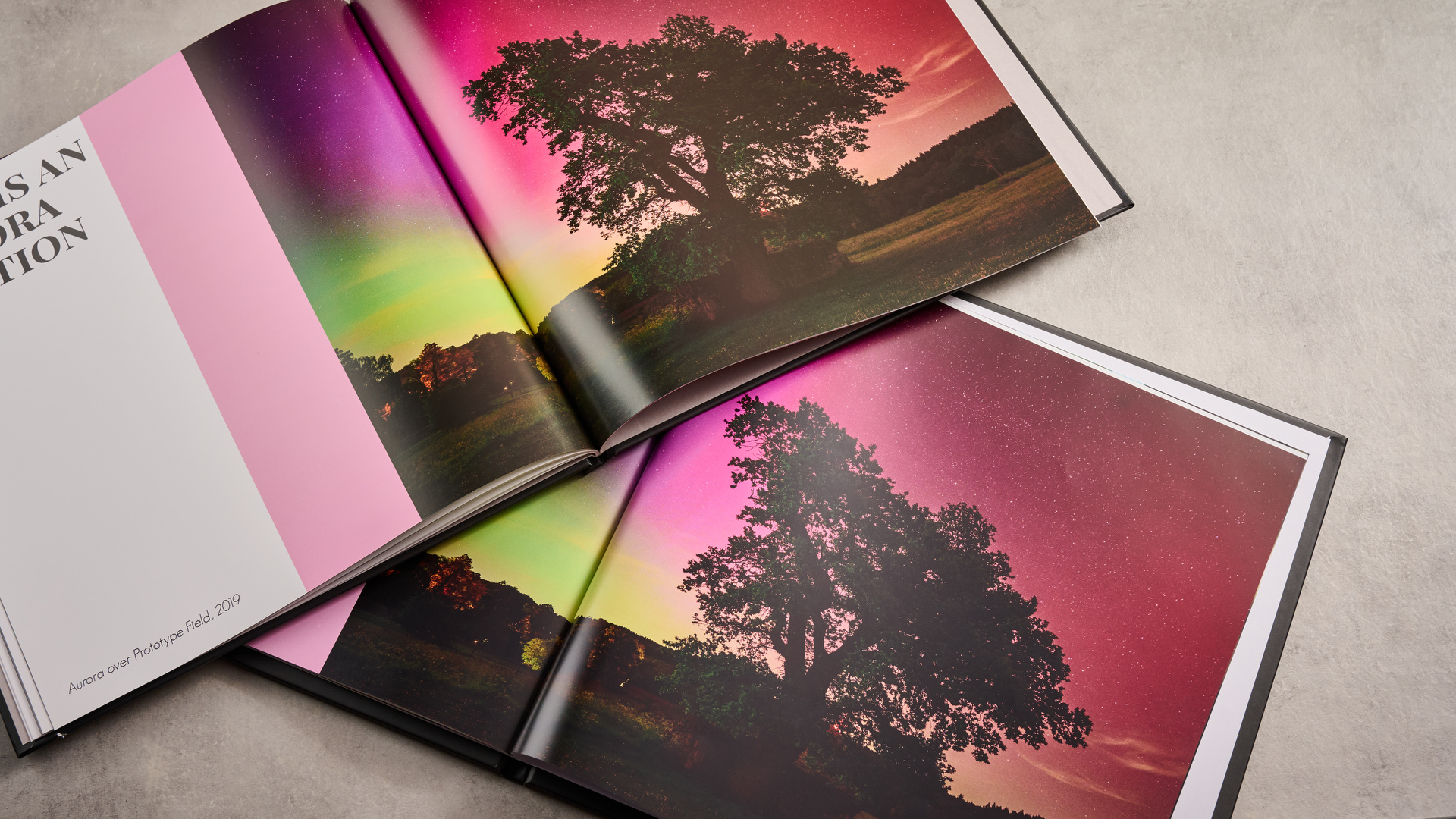 A comparison of two photo books showing pictures of an aurora, with the Blurb photo book at the top and the Mixbook photo book at the bottom.