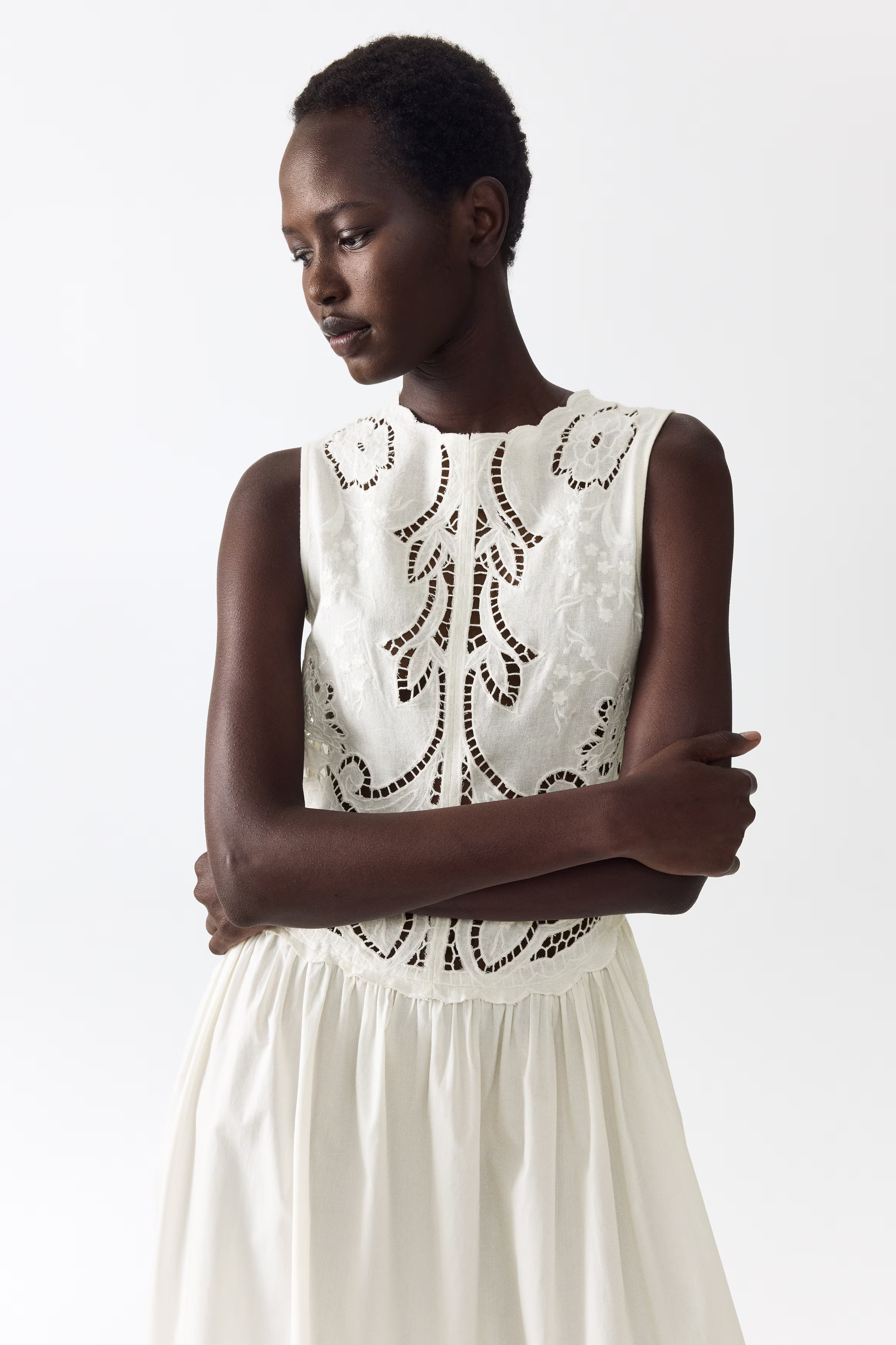This Expensive-Looking H&amp;amp;M Dress Is About to be Everywhere, close model shot of the H&amp;amp;M Embroidered Linen-blend Dress, here you can see the details.
