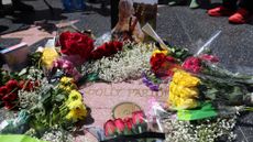 Flowers on Dolly Parton's star on the Hollywood Walk of Fame.