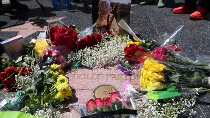Flowers on Dolly Parton's star on the Hollywood Walk of Fame.