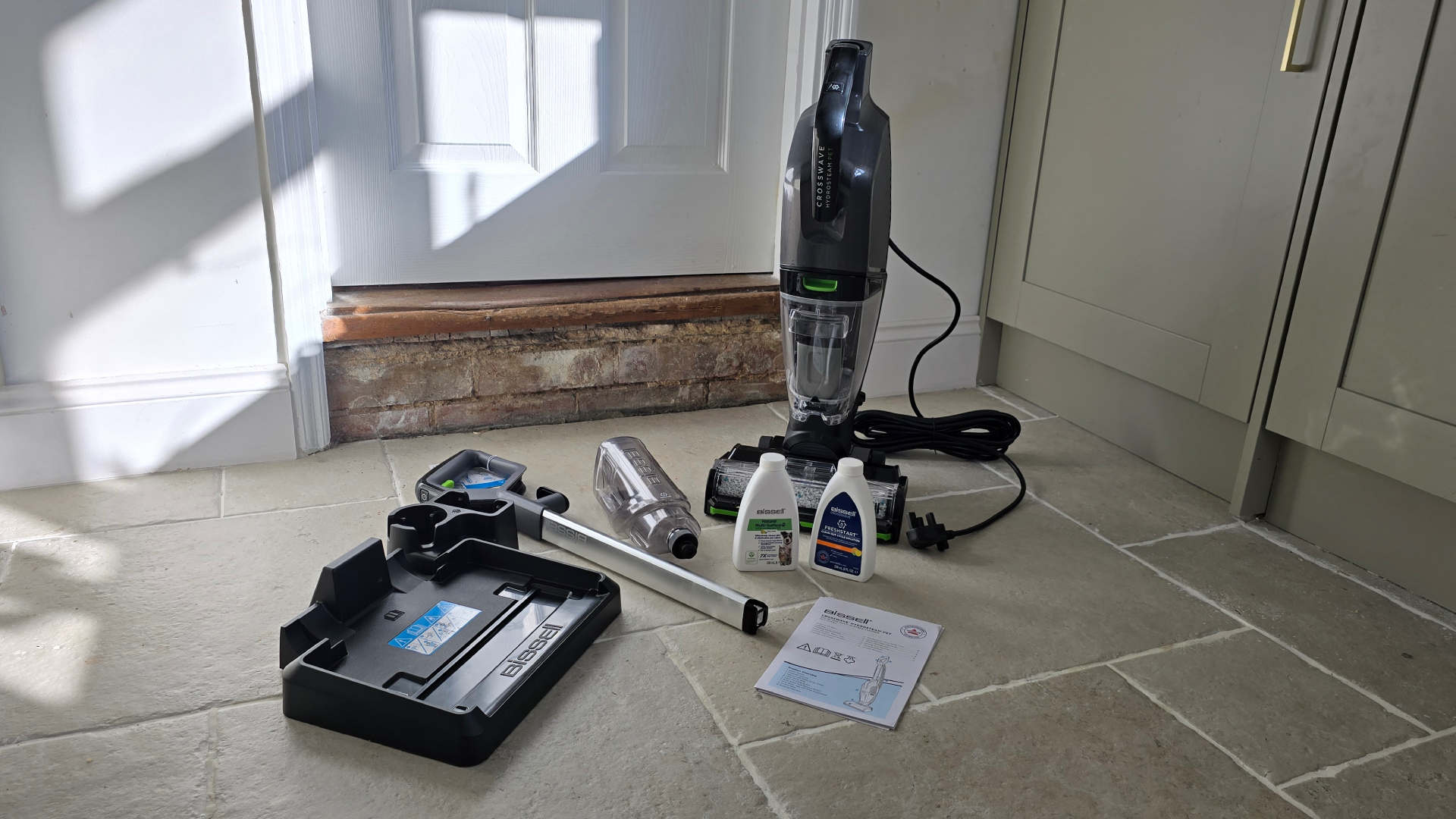 Bissell CrossWave HydroSteam Pet parts unboxed on kitchen floor