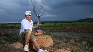 Louis Oosthuizen with the AfrAsia Bank Mauritius Open trophy