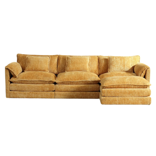 A yellow chenille sectional couch