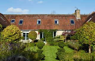 formal back garden outside barn conversion