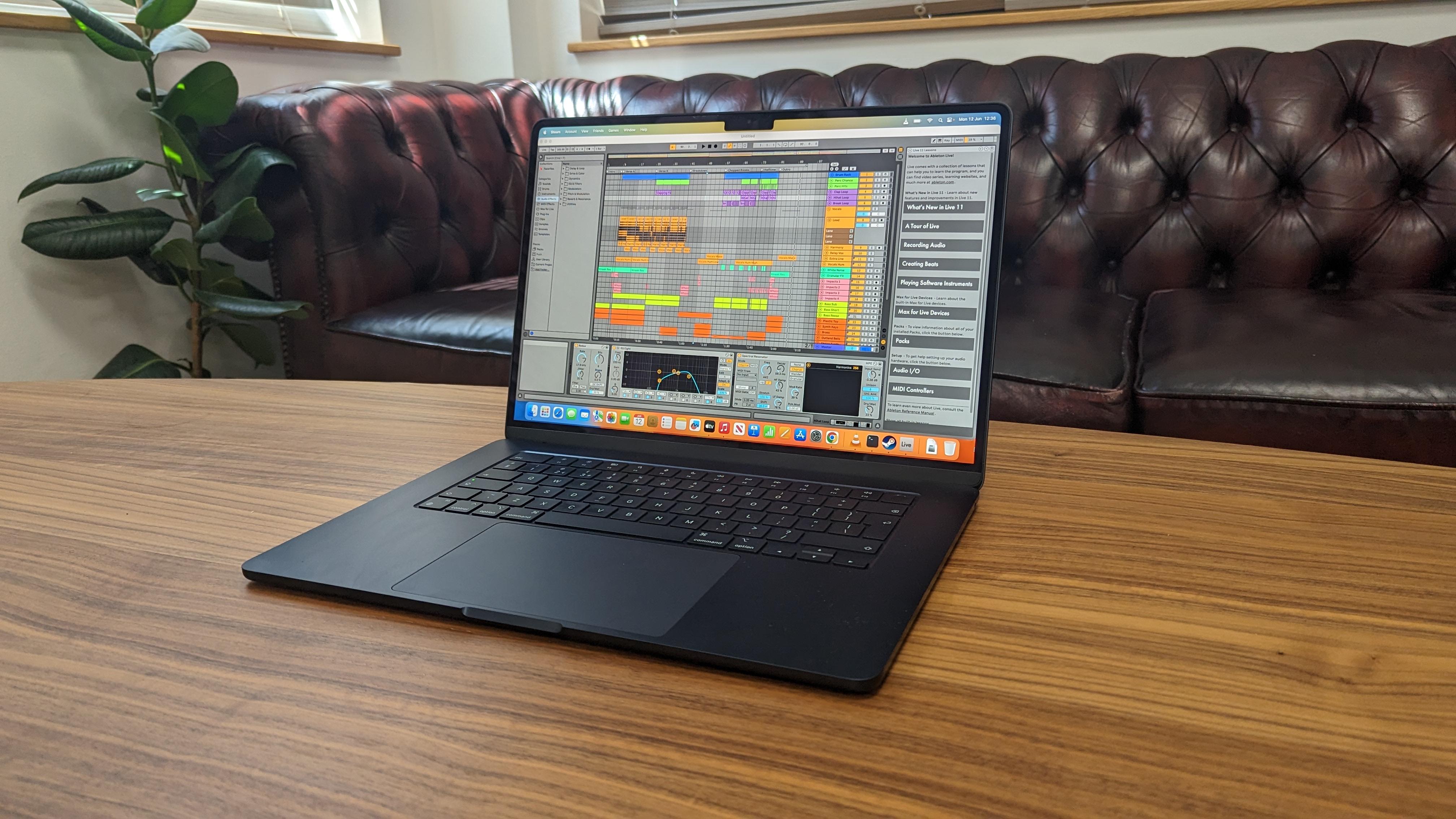 15-inch MacBook Air on wooden table at home