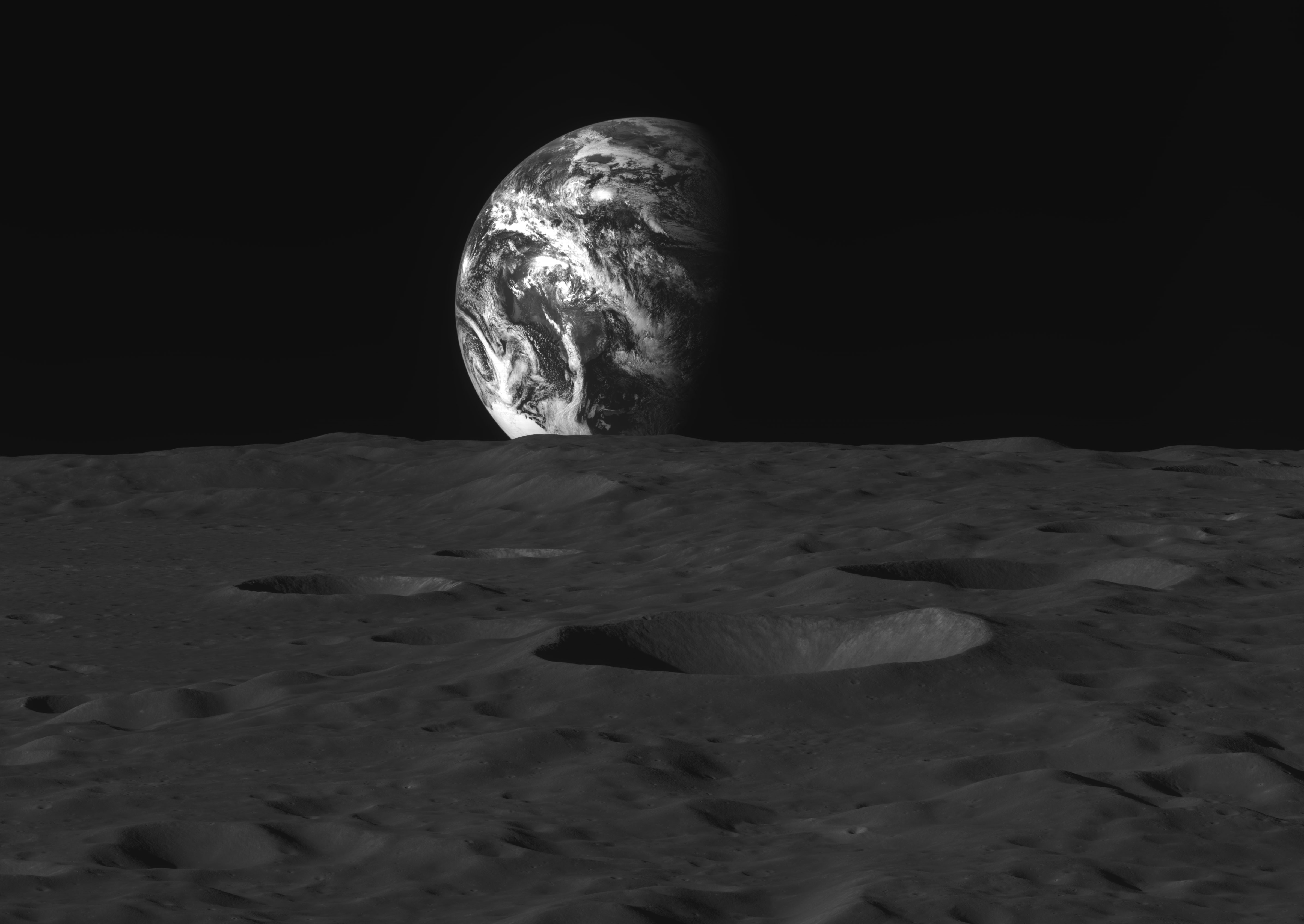 La tierra se eleva sobre el horizonte de la luna.