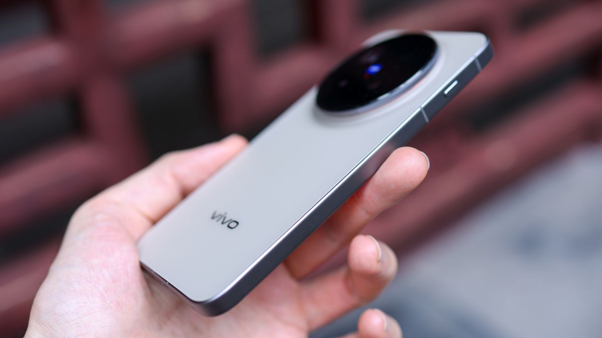 Vivo X300 Pro camera phone held in a hand