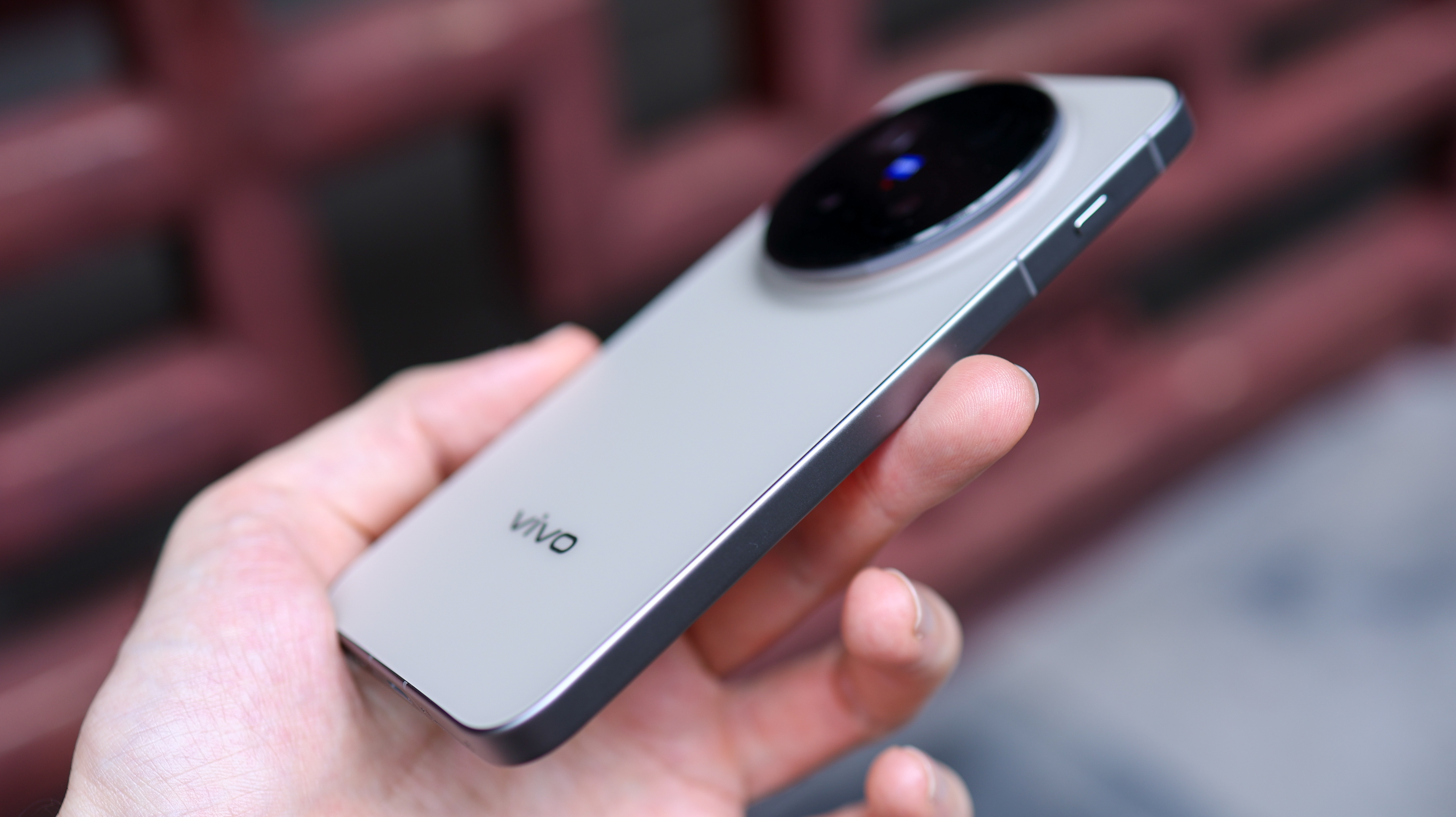 Vivo X300 Pro camera phone held in a hand