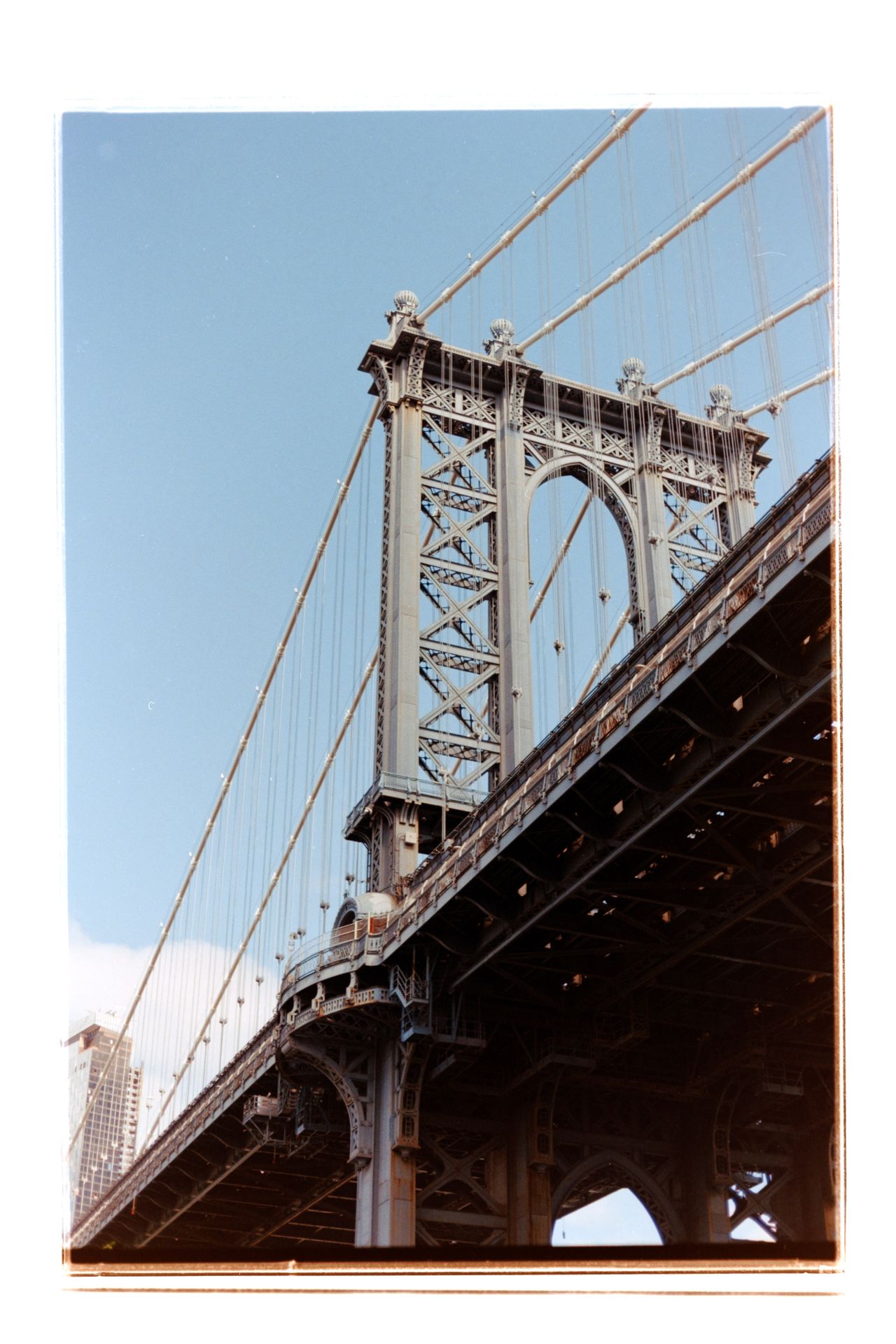 View of the Brooklyn bridge from below in New York City