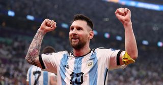 Lionel Messi celebrates after their sides third goal by Julian Alvarez of Argentina (not pictured) during the FIFA World Cup Qatar 2022 semi final match between Argentina and Croatia at Lusail Stadium on December 13, 2022 in Lusail City, Qatar.