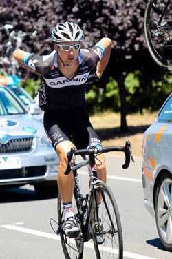 Matt Wilson (Garmin-Cervelo) fills up with bidons.