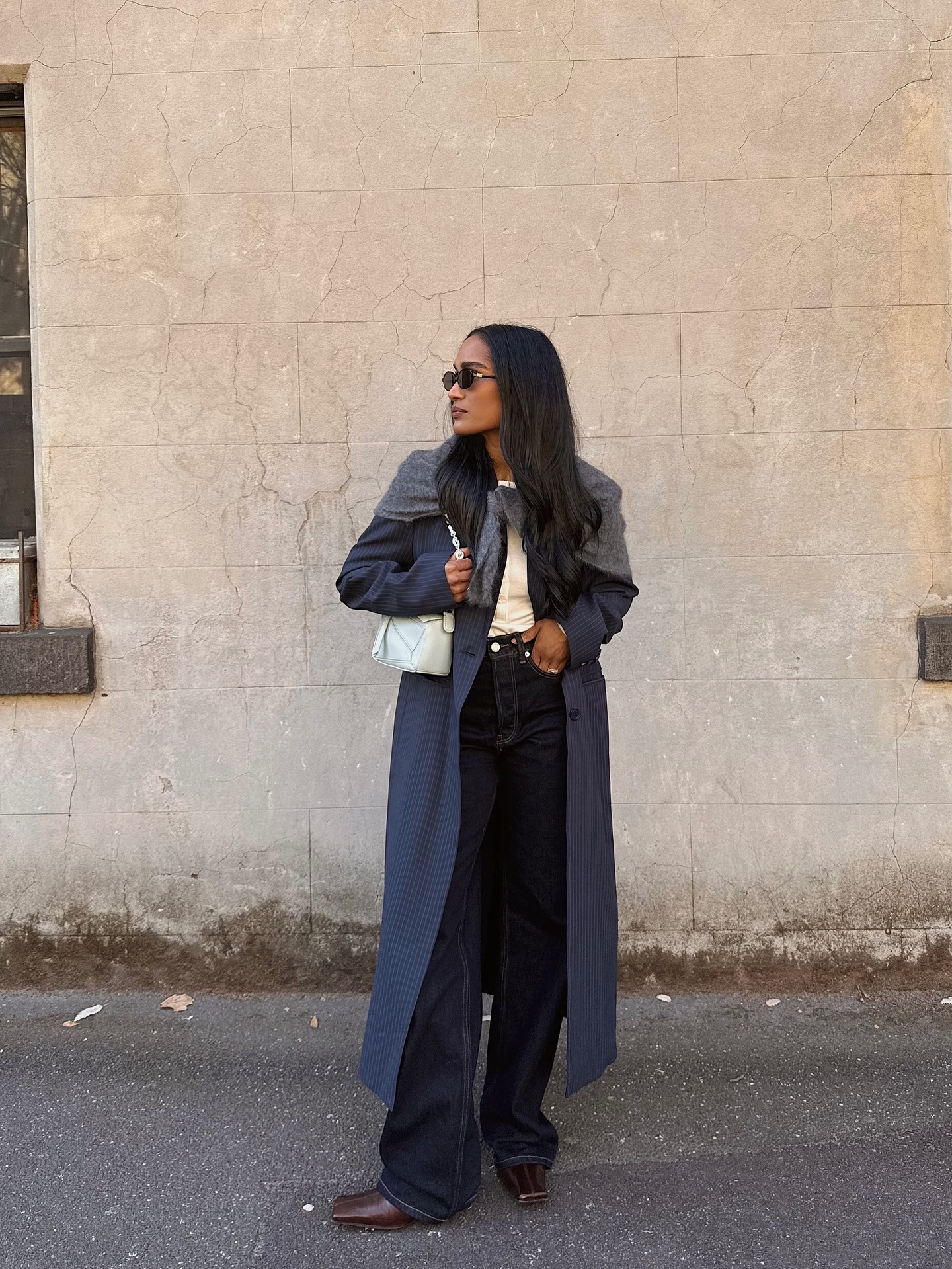 @divrav wearing a dark indigo denim jeans outfit.