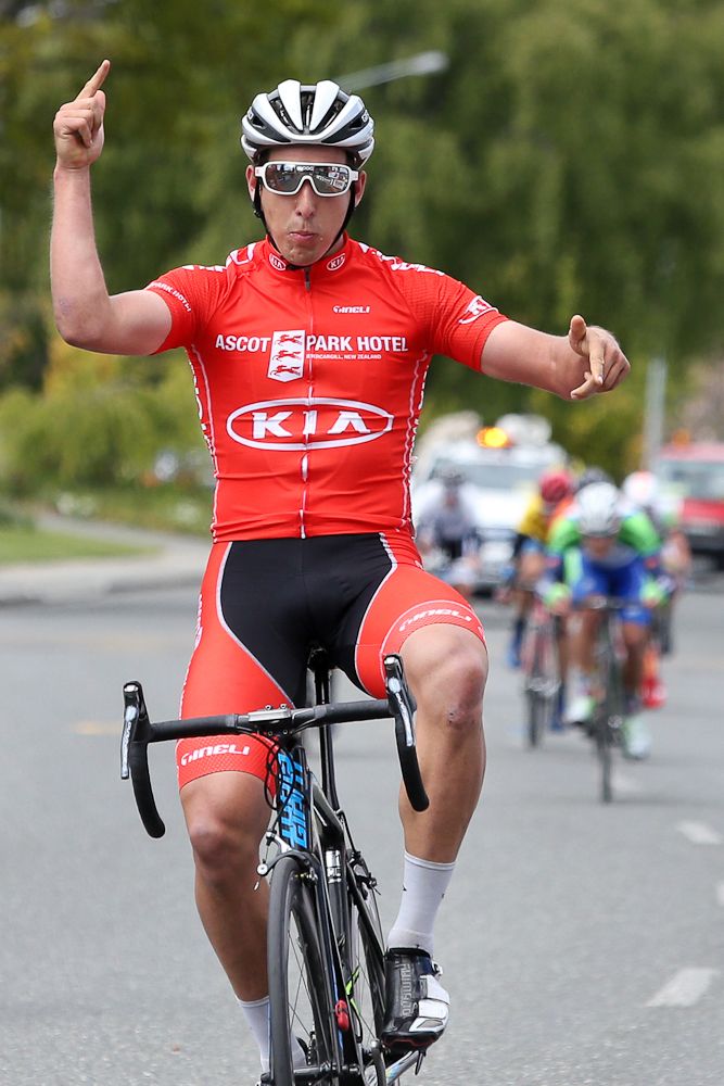 Alex Frame of Christchurch celebrates finishing first at Te Anau in stage three of the Tour of Southland