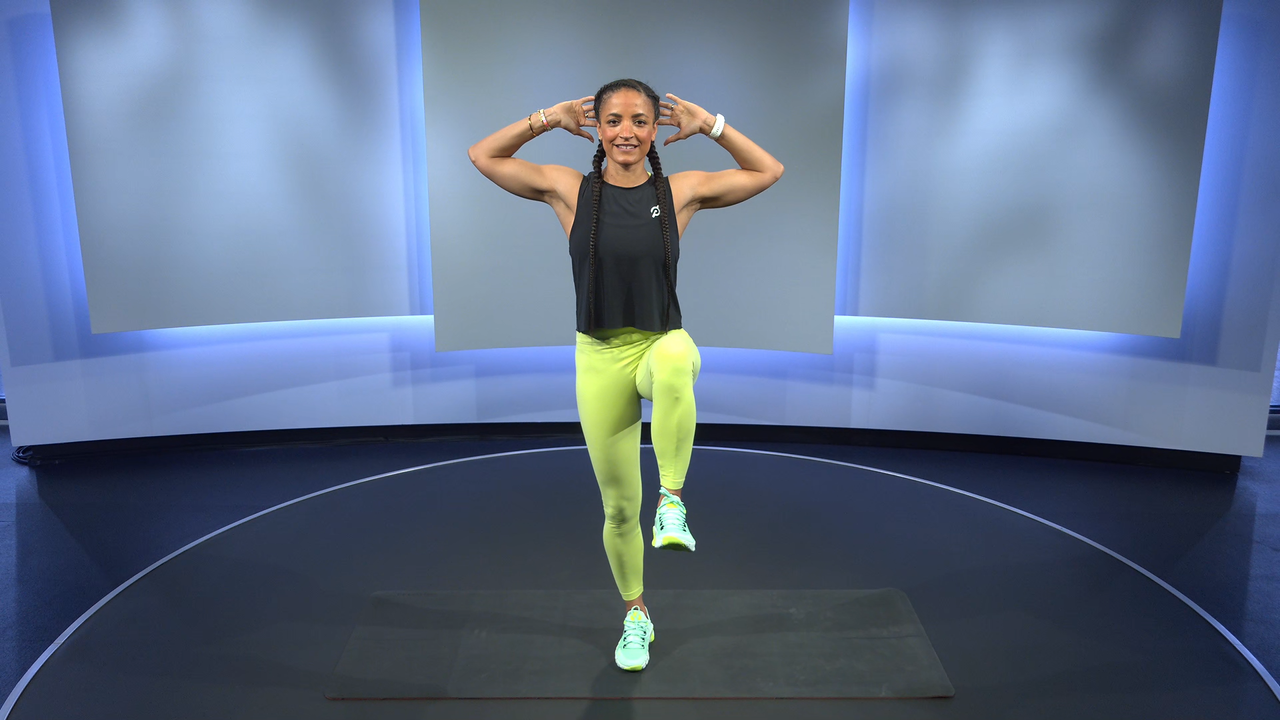 Peloton instructor Joslyn Thompson leading a core workout in the Peloton studio 