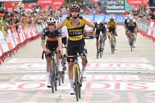 Stage winner Team Jumbos Slovenian rider Primoz Roglic crosses the finish line in first place followed by Team Quick Steps Belgian rider Remco Evenepoel L during the stage 8 of the 2023 La Vuelta cycling tour of Spain a 165 km race from Denia to Xorret de Cati in Castalla on September 2 2023 Photo by JOSE JORDAN AFP Photo by JOSE JORDANAFP via Getty Images