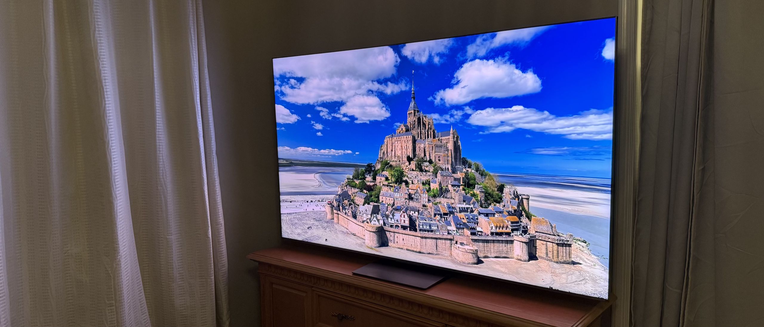 'I was enthralled with the sharp, smooth, and bright image': I tested the TCL QM8L TV for weeks, and it's a total blockbuster for most people, especially if you watch in bright rooms