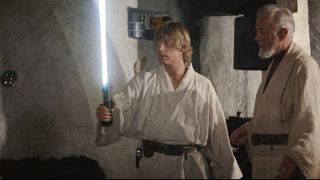 Luke with lightsaber
