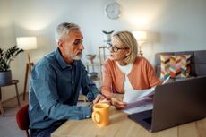 Couple going over their will at home