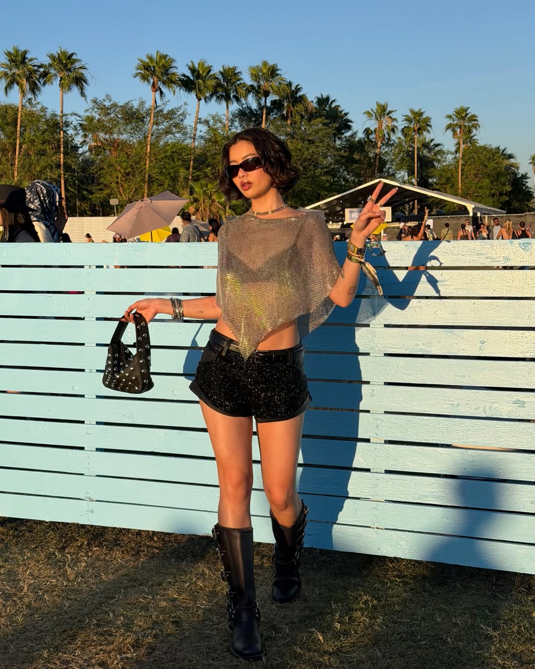 Steph Hui in a sheer poncho.