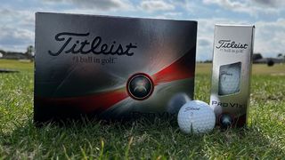 Titleist Pro V1x 2023 Golf Balls resting on the green