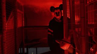 A murderer dressed as Mickey Mouse from the new film Mickey's Mouse Trap