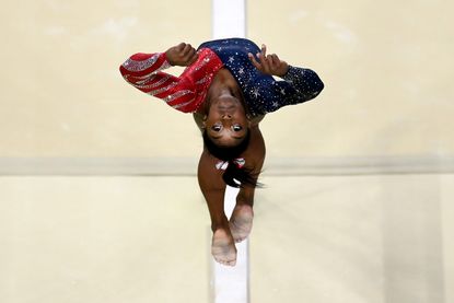 Simone Biles competes in Rio