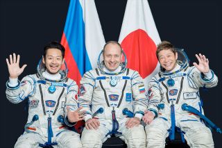Soyuz MS-20 crew, from the left: assistant Yozo Hirano, cosmonaut Alexander Misurkin and billionaire Yusaku Maezawa.