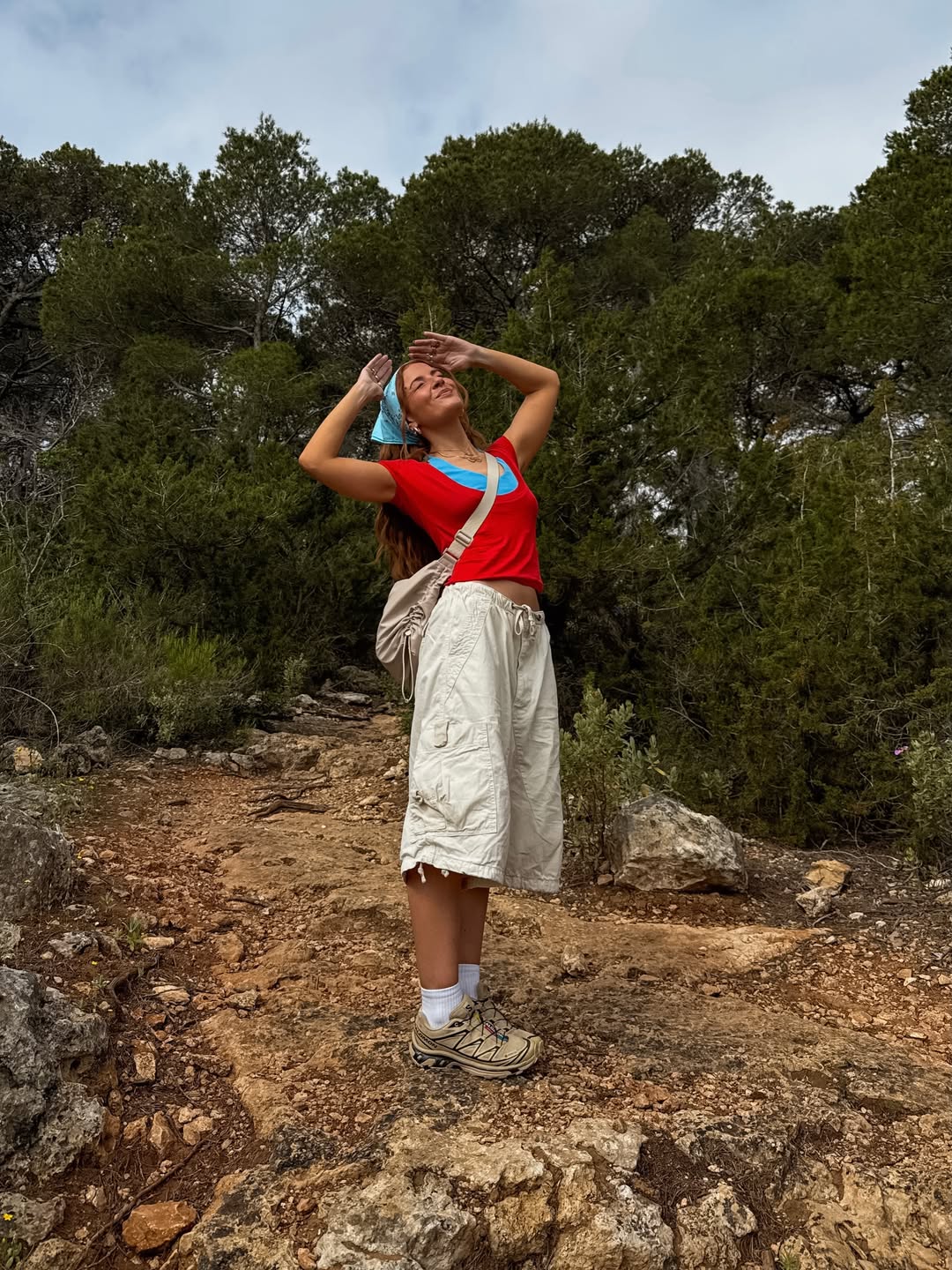 Rebecca wearing biege trainers