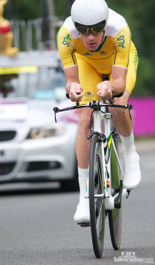Michael Rogers of Australia with his trademark wide arm position. He looks to be on a Cervelo P3 with Pro bars, Scott helmet and Smart shoe covers and a bolt instead of a front quick release. He finished a commendable 6th.
