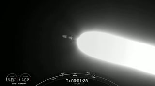A SpaceX Falcon 9 rocket launches 60 Starlink internet satellites into orbit from NASA's Kennedy Space Center in Cape Canaveral, Florida as it makes a record 9th trip to space on March 14, 2021.