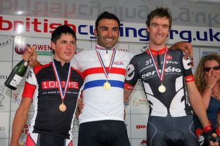 A beaming House on the podium with Peter Kennaugh (l) and Dan Lloyd.
